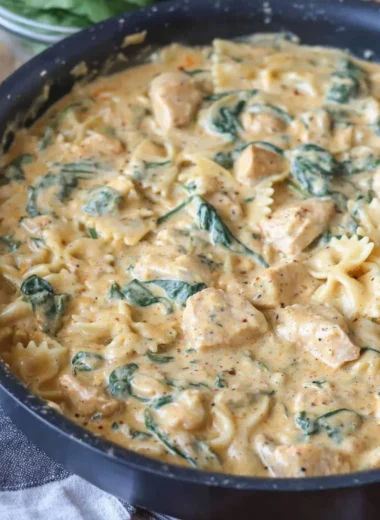 Dairy Free Chicken Alfredo served in a bowl with fresh herbs