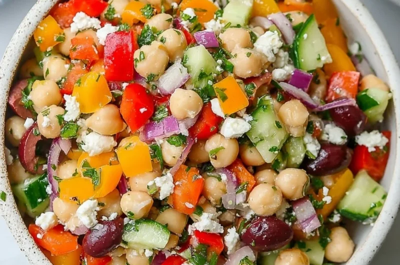 A colorful and nutritious dense bean salad with a variety of beans and veggies.