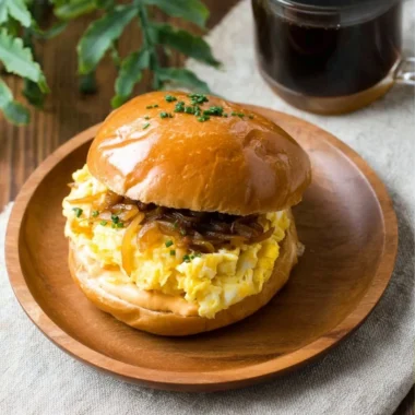 Delicious Eggslut breakfast sandwich with eggs and toppings