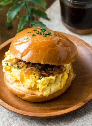 Delicious Eggslut breakfast sandwich with eggs and toppings
