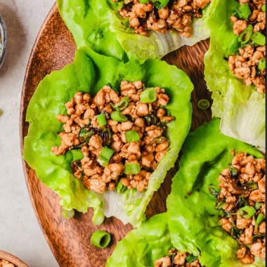PF Chang's Chicken Lettuce Wraps recipe with fresh ingredients in lettuce leaves