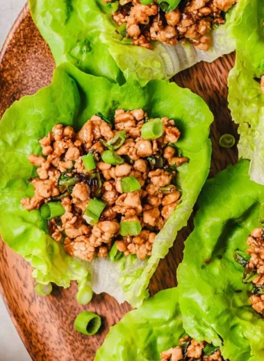 PF Chang's Chicken Lettuce Wraps recipe with fresh ingredients in lettuce leaves
