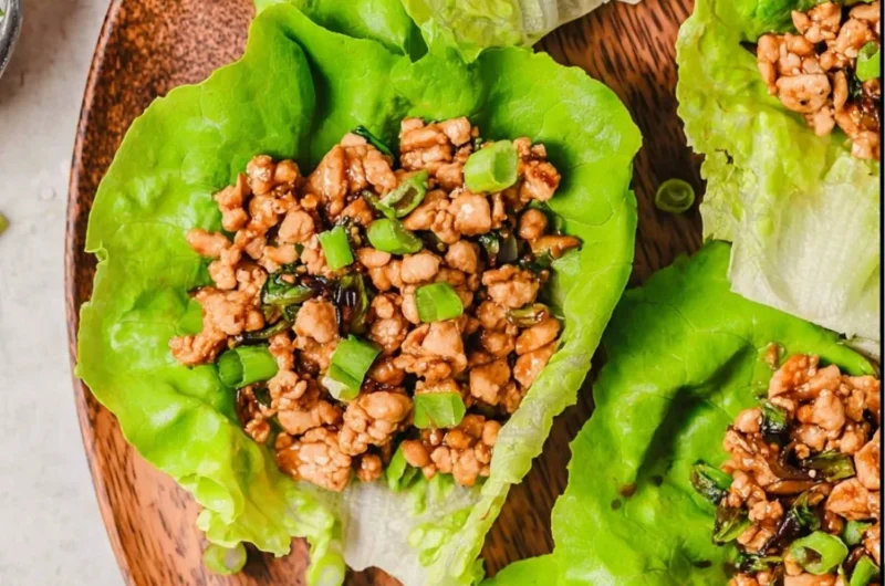 PF Chang's Chicken Lettuce Wraps recipe with fresh ingredients in lettuce leaves