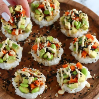 Colorful sushi cups filled with fresh ingredients for a perfect bite-sized treat.