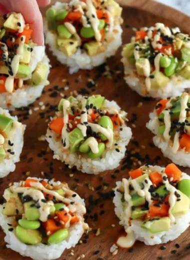 Colorful sushi cups filled with fresh ingredients for a perfect bite-sized treat.