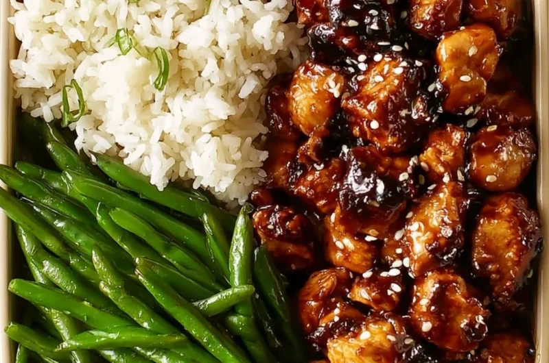Healthy Asian high protein sesame chicken dish with sesame seeds and colorful vegetables