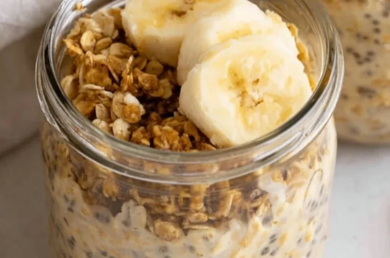Bowl of brown sugar overnight oats topped with fresh fruit and nuts
