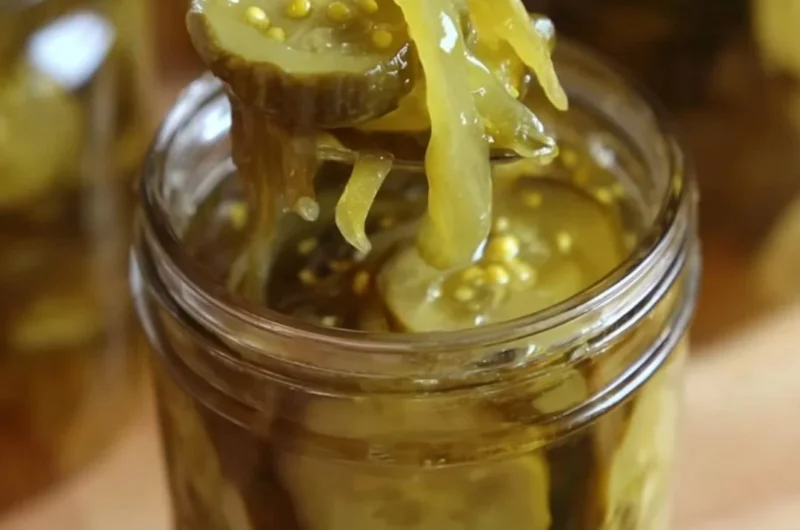 Jars of Granny's homemade bread and butter pickles on a kitchen counter