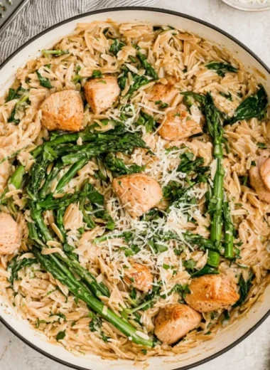 High protein chicken orzo dish with vegetables and herbs