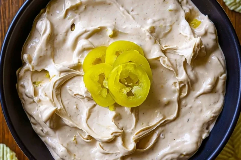 Delicious Mississippi Pot Roast Dip served in a bowl with garnishes
