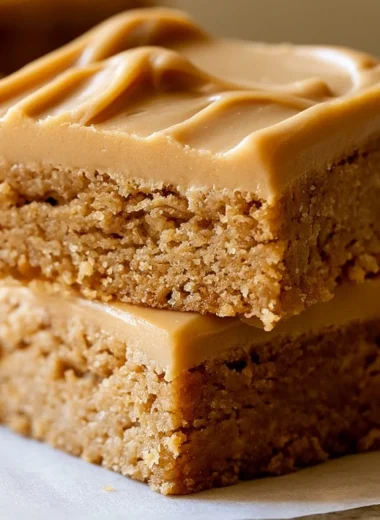 Peanut Butter Lunch Lady Bars fresh out of the pan, cut into squares.