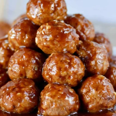 Delicious slow cooker Hawaiian teriyaki meatballs served on a plate with garnish