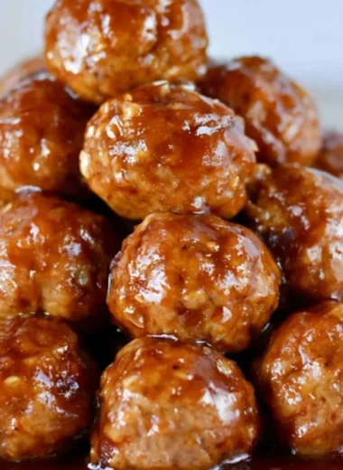 Delicious slow cooker Hawaiian teriyaki meatballs served on a plate with garnish