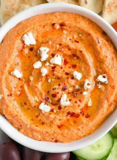 Delicious Tirokafteri, a spicy Greek feta dip served with pita bread.