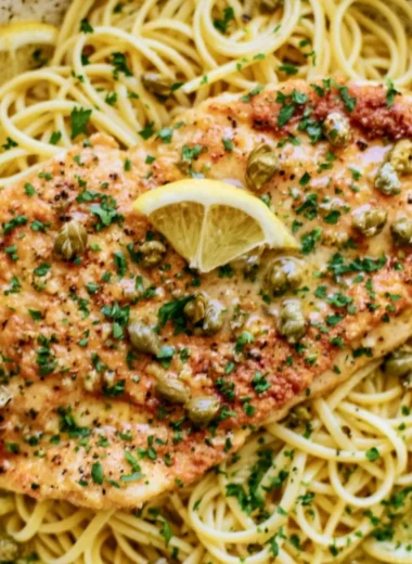 Easy chicken piccata dish with lemon, capers, and parsley garnish.