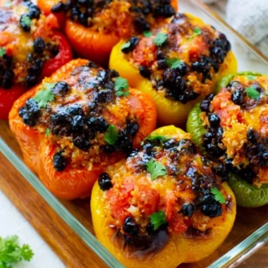 Easy vegetarian stuffed peppers filled with rice, beans, and vegetables
