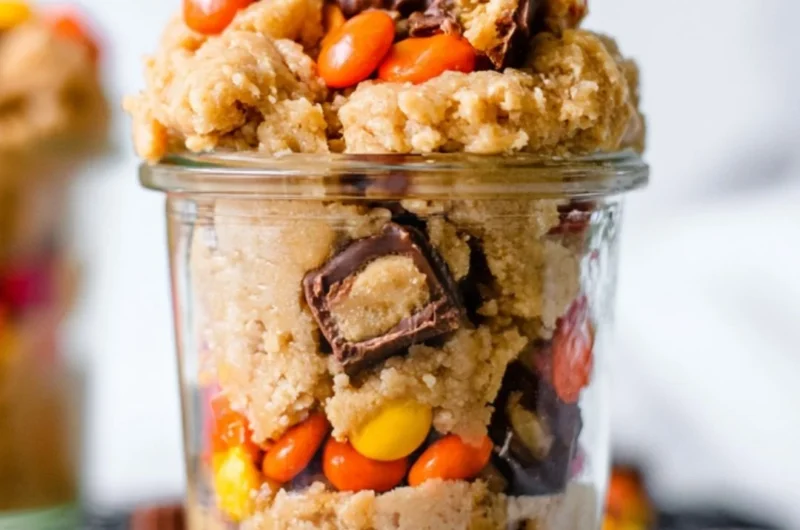 Delicious edible peanut butter cookie dough in a bowl with chocolate chips.