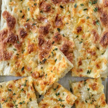 Savory Italian Focaccia topped with Gruyère cheese and fresh thyme