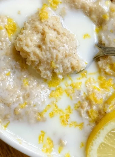 Delicious lemon baked oats with fresh lemon zest and a golden top