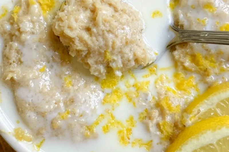 Delicious lemon baked oats with fresh lemon zest and a golden top
