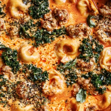 One-pot creamy tortellini soup made in a Le Creuset Dutch oven