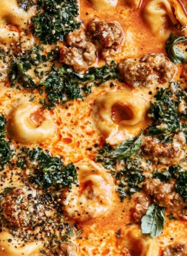One-pot creamy tortellini soup made in a Le Creuset Dutch oven
