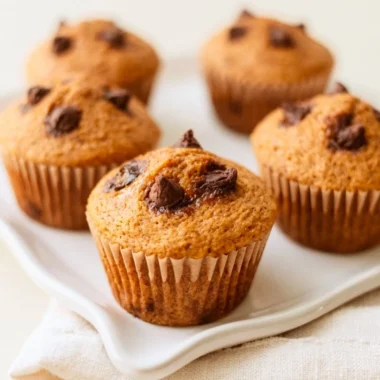 Delicious pumpkin chocolate muffins baked to perfection with chocolate chips