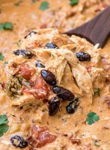 Slow Cooker Cream Cheese Crack Chicken Chili served in a bowl with toppings