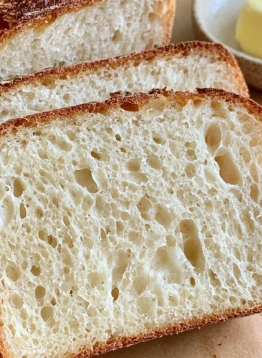Freshly baked sourdough sandwich loaf ready for delicious sandwiches.