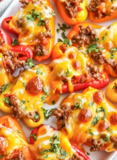 Taco stuffed mini peppers filled with seasoned meat and cheese