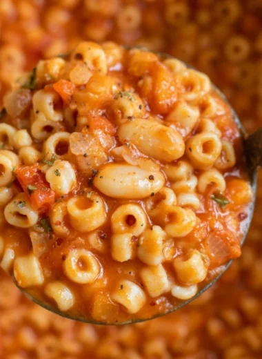 Delicious bowl of Pasta Fagioli Soup with beans and pasta garnished with herbs