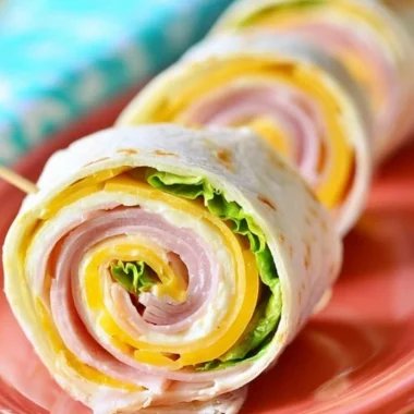 Ham and cheese pinwheels served on a platter
