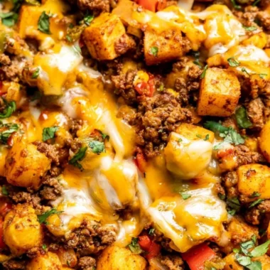 Delicious Mexican ground beef and potato skillet dish served in a frying pan.